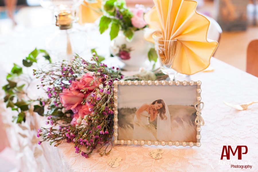 Lovely pink and yellow centerpieces at this Summit Dining Hall wedding. Image by Aura Marzouk Photography.