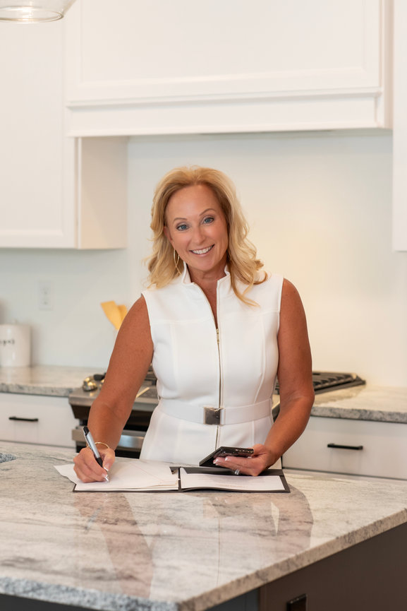 Woman standing in modern kitchen