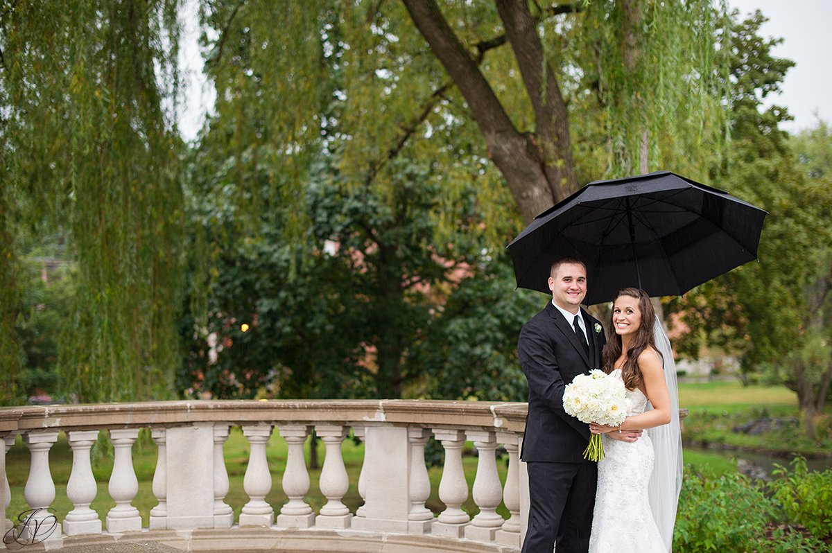 bride and groom rain summer congress park