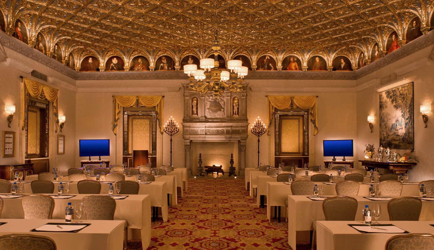 Breakers Hotels Gold room in PAlm Beach Florida with Murals of empires surrounding the rooms ceiling and historical Architecture set for a classroom style meeting.