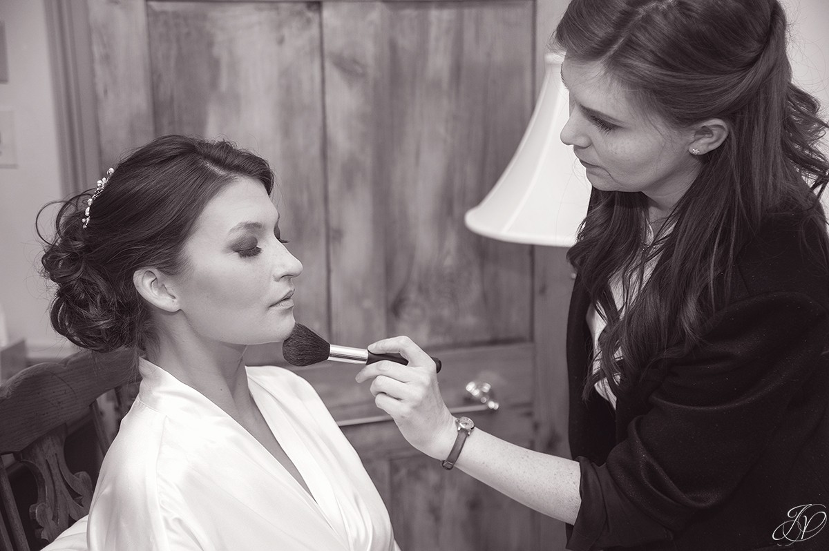 bride in getting ready robe at Shenandoah valley golf club