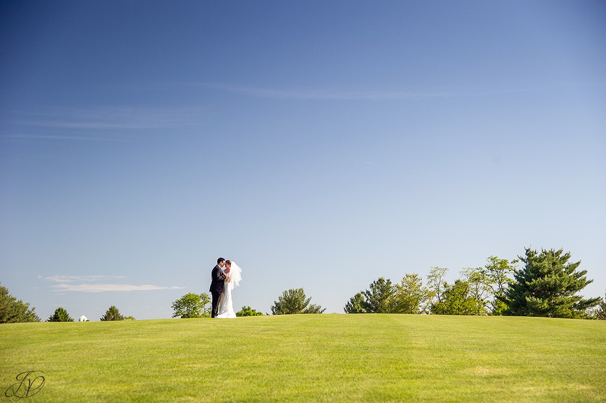 bride and groom golf course photo