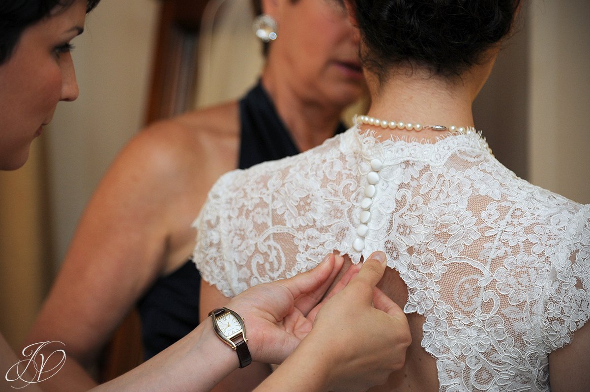 buttoning up wedding gown, Wedding at The Pruyn House, Albany Wedding Photographer