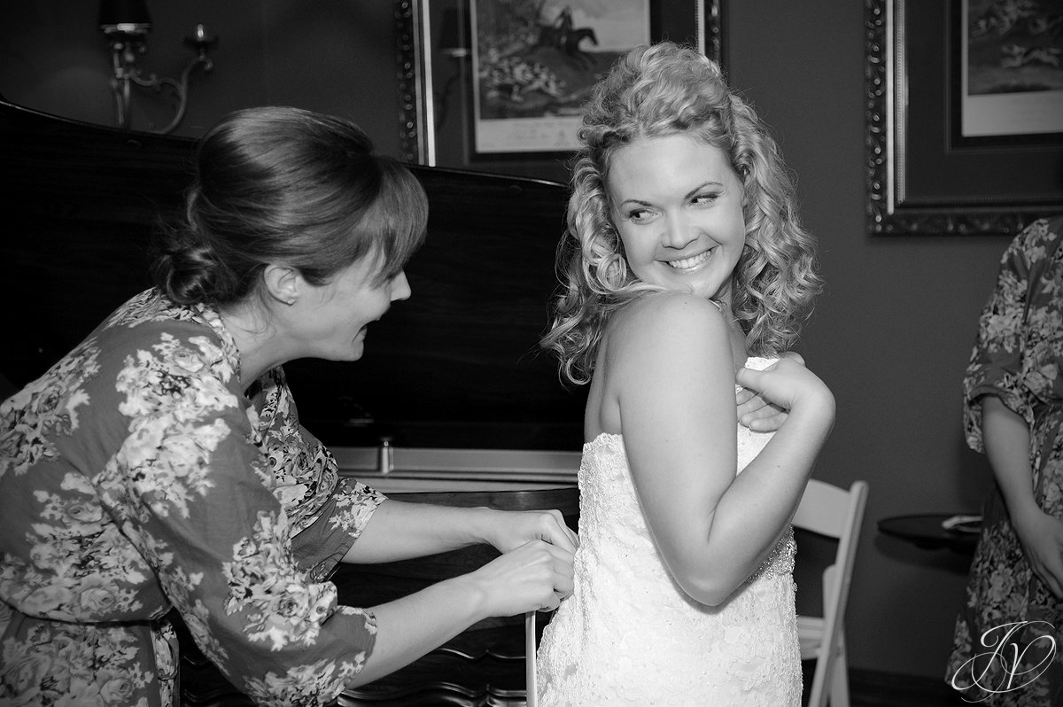 bride and mother getting ready, getting wedding dress on, getting ready wedding photo, Saratoga Wedding Photographer, The Mansion Inn rock city falls