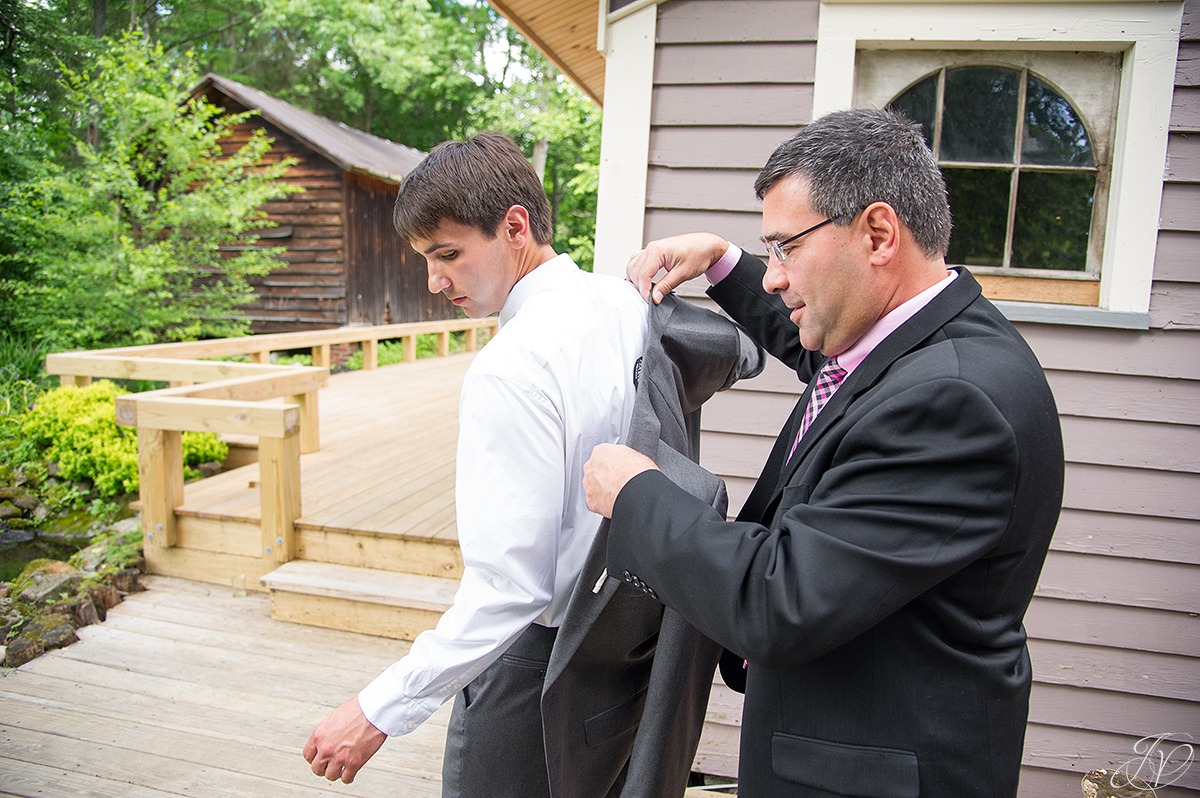 groom getting dressed