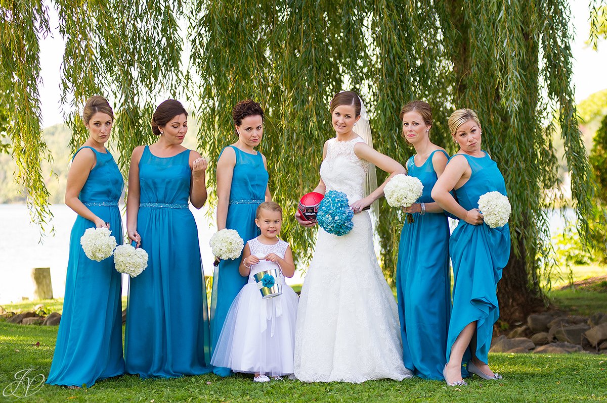 funny shot of bridesmaids doing the pose from bridesmaids