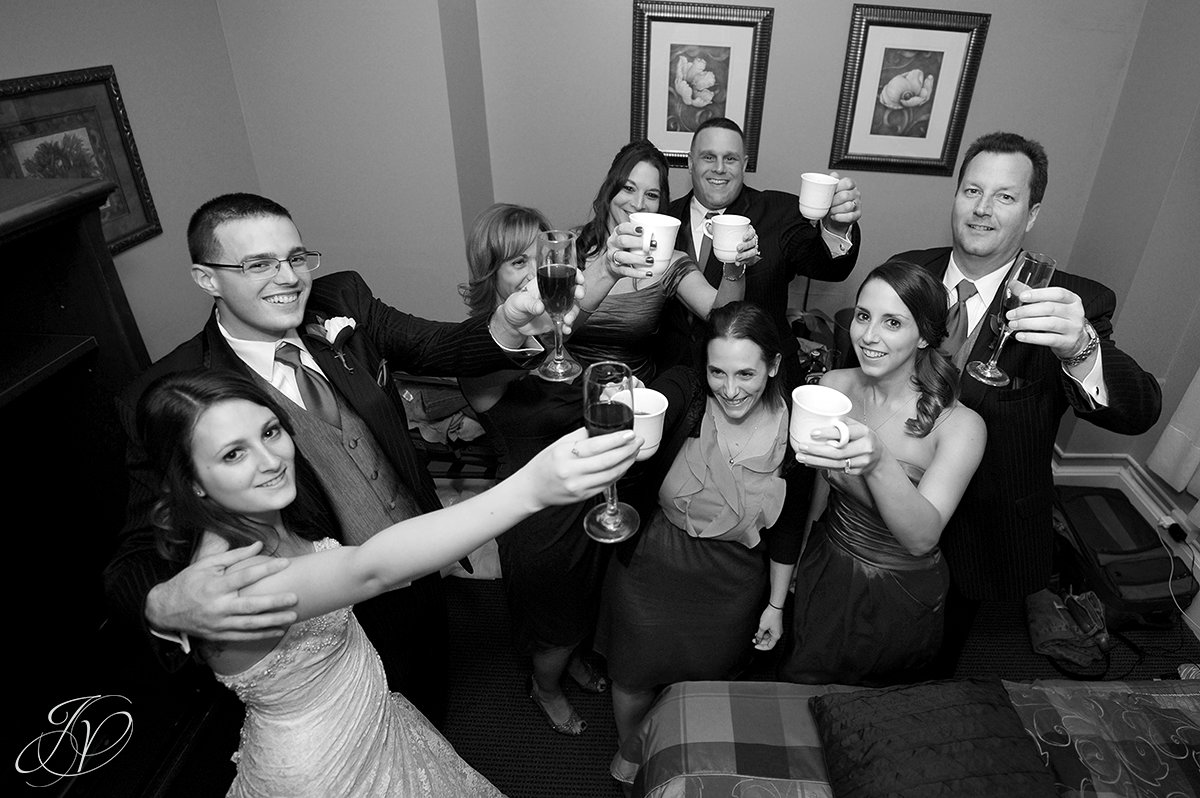 family toast photo, extra special wedding toast, bride partying photo, bride dancing candid, Schenectady Wedding Photographer, The Stockade Inn, Reception candid photos, guests dancing candids, reception at the stockade inn