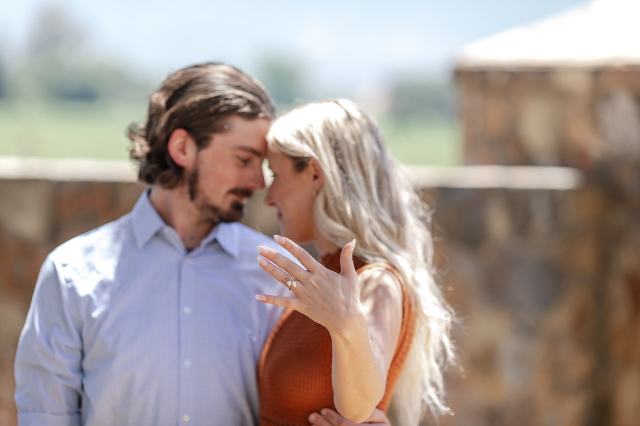 Engaged couple during a photoshoot with Sheila Johnson Studio J Photography