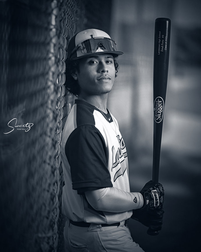 Senior portrait at Panther Creek village green The Woodlands by Swartz Portraits