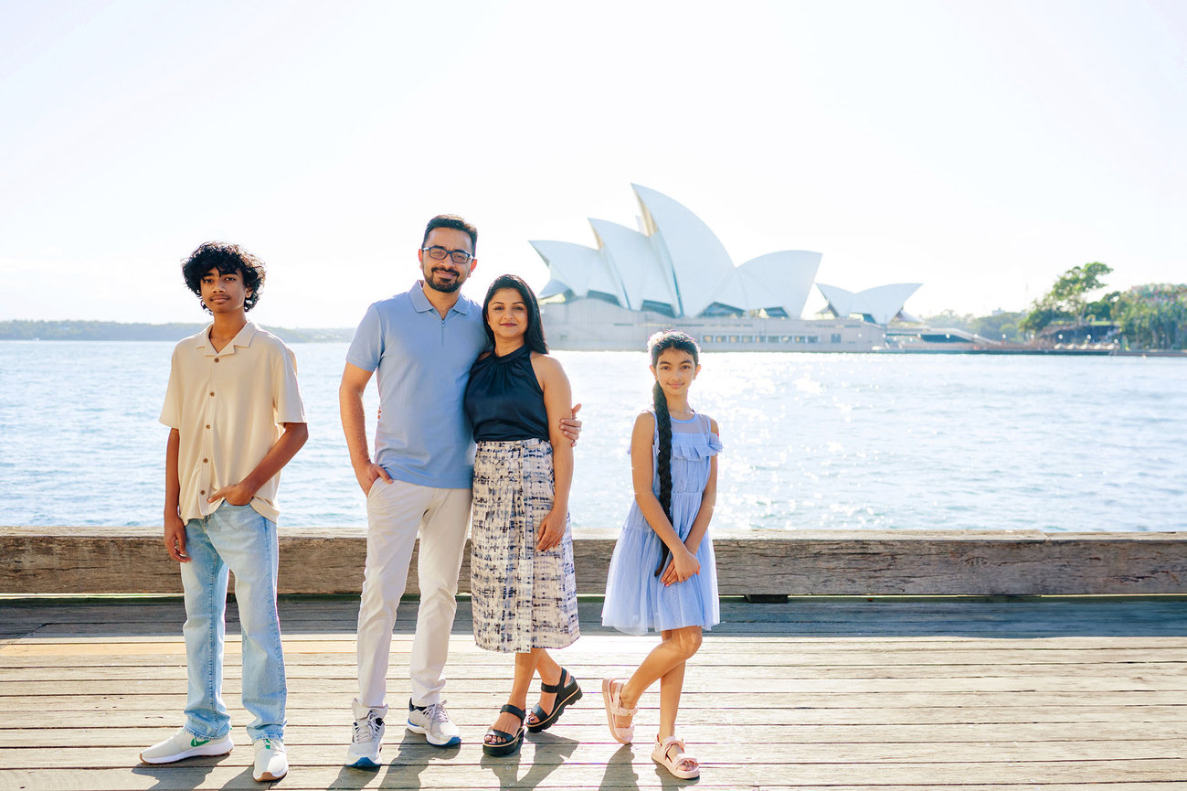 Portrait of a family with Sydney Opera House during a family photography session with Sarah Iris Photography.
