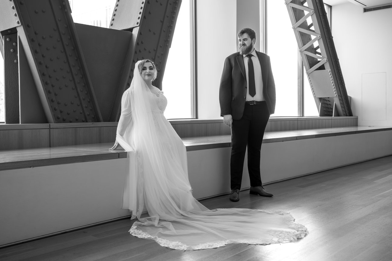 Portrait: Just-married couple posing at the Art Institute of Chicago.