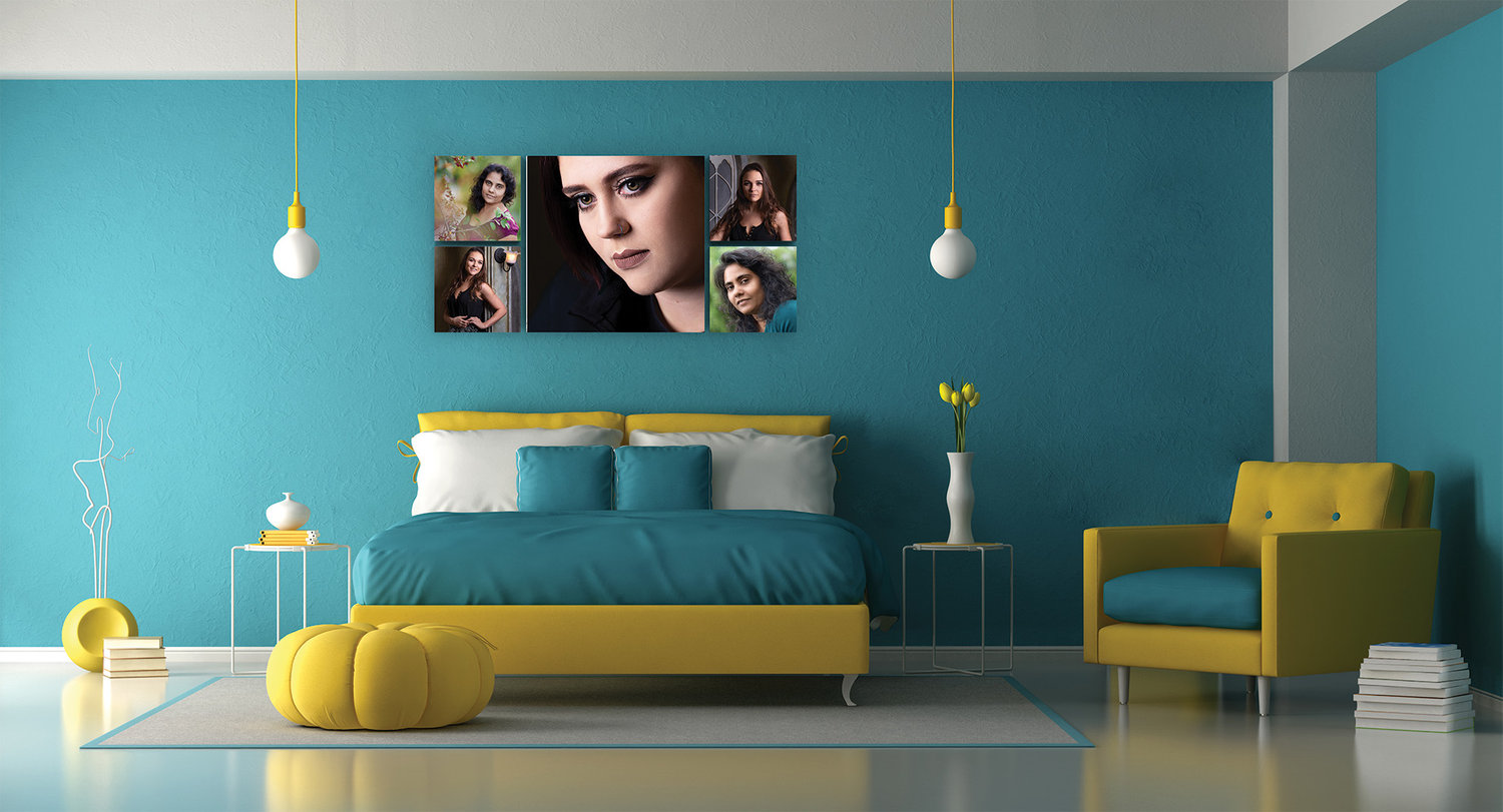 personal portrait wall collection with central image and supporting portraits displayed above bed in a modern home interior