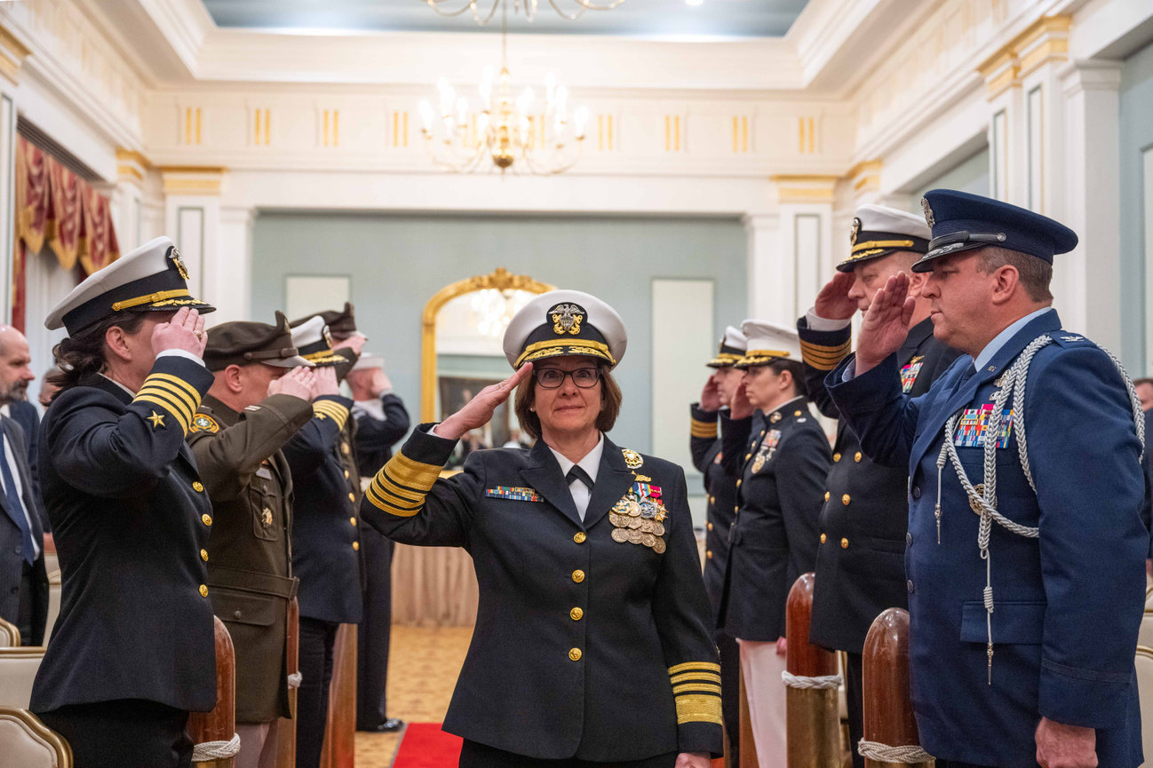 Admiral Franchetti rendering a salute during a retirement ceremony