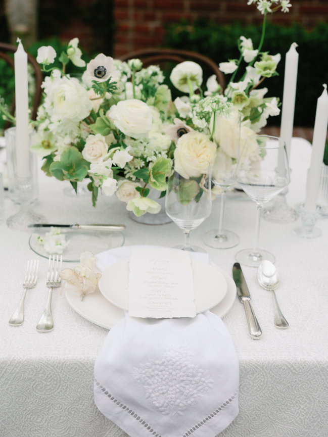 White wedding inspiration, compote vase floral , assorted bud vases and luxurious place setting all in white
