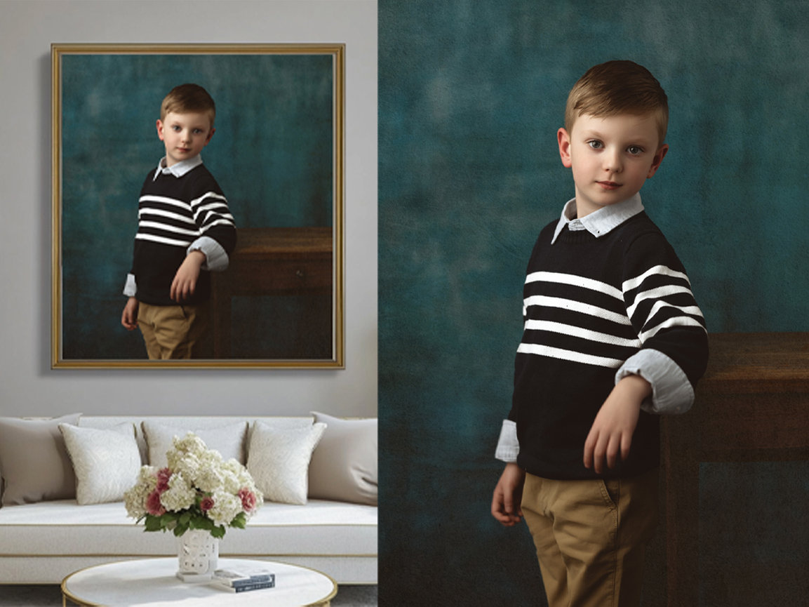Fine-art portrait of a young boy in a navy and white striped sweater, posed with one arm on a wooden table in front of a textured teal backdrop; framed version displayed in a modern living room.