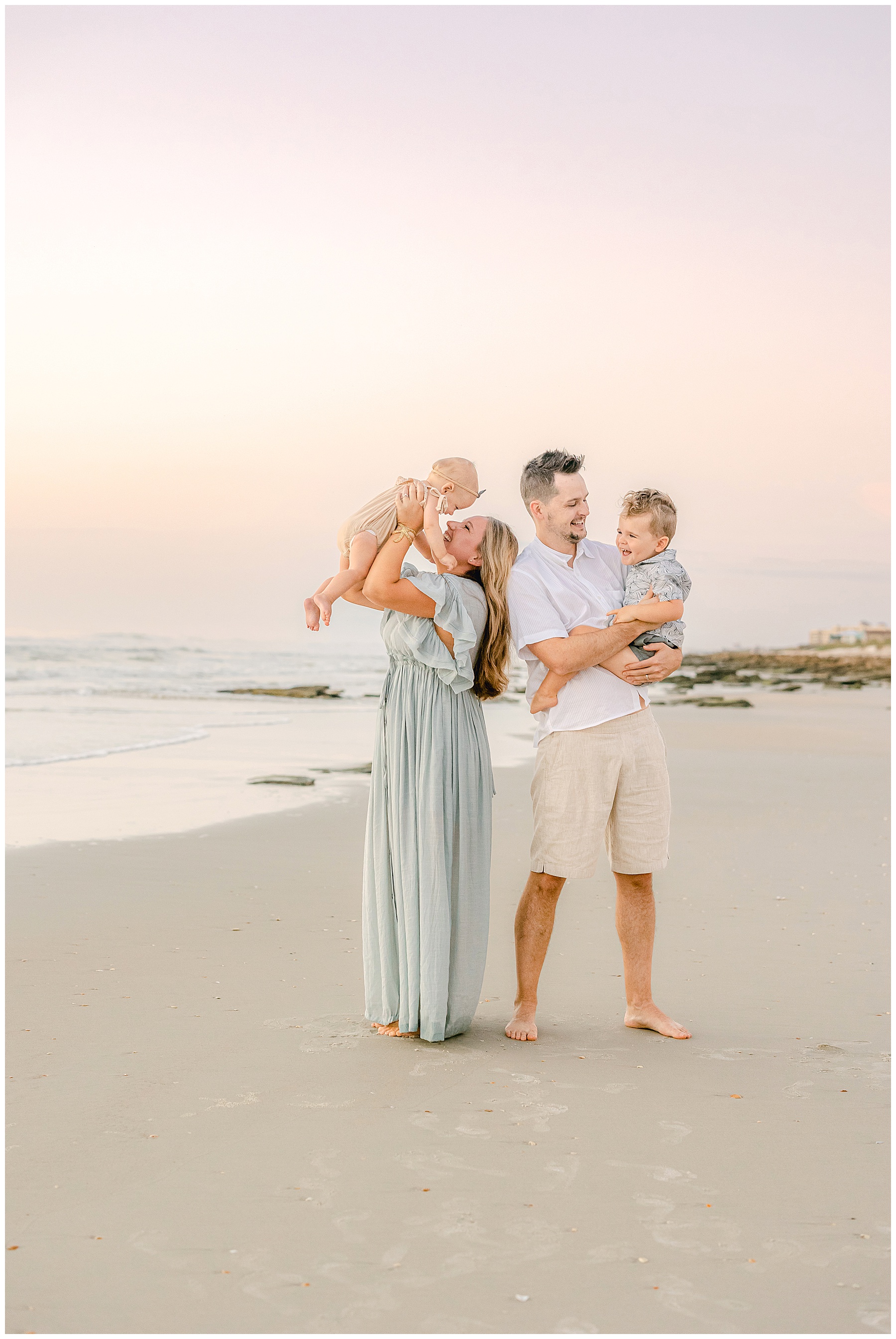 pastel coastal family sunrise portrait on saint augustine beach