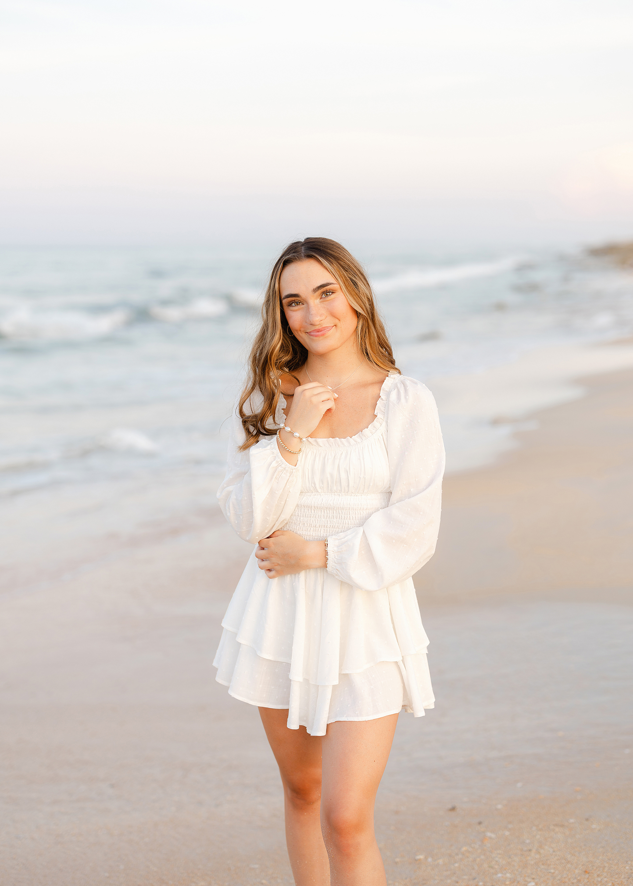 Light and airy grad portrait session in St. Augustine Beach.