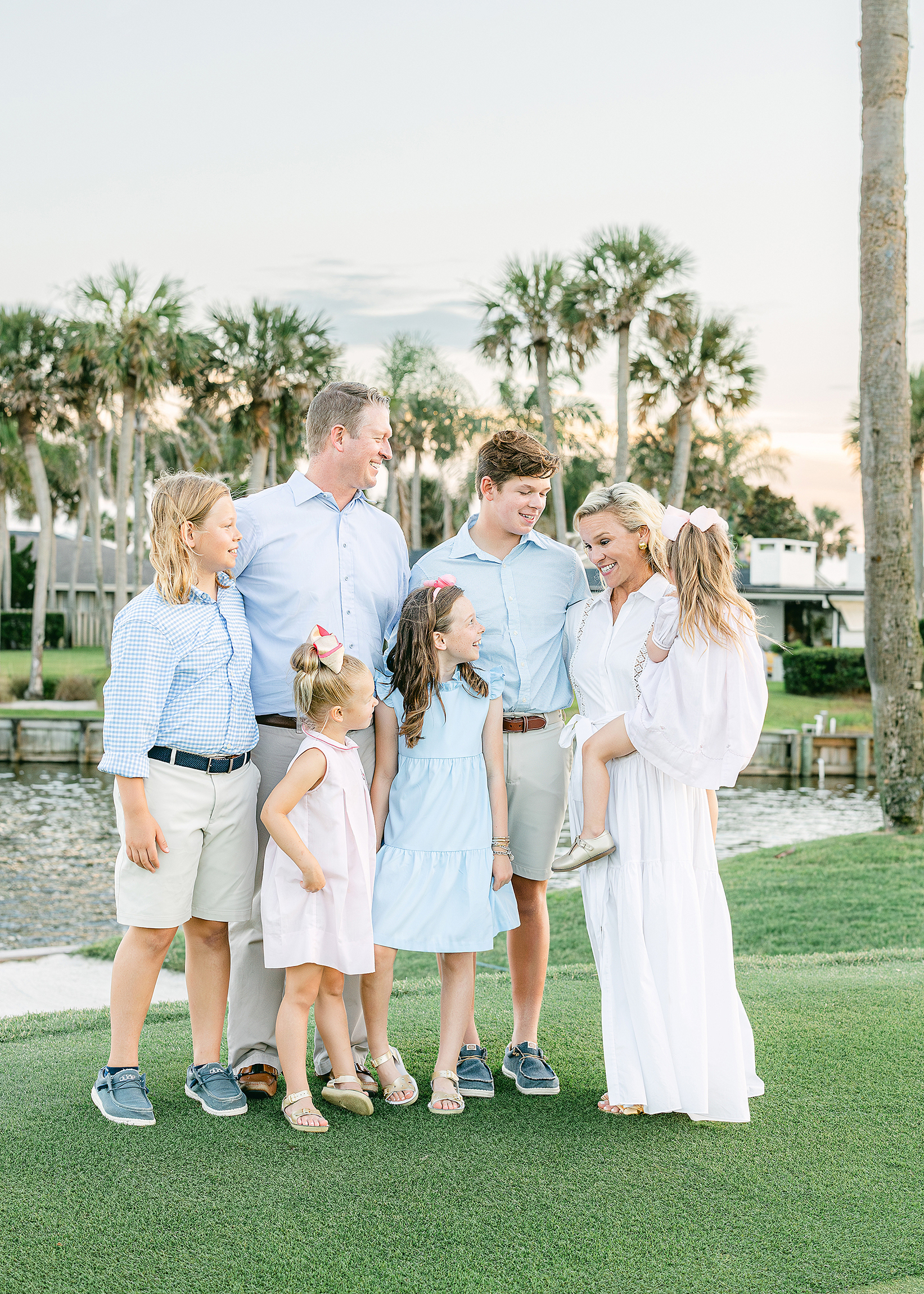 A sunset family portrait on the golf course at Ponte Vedra Beach Inn and Club.