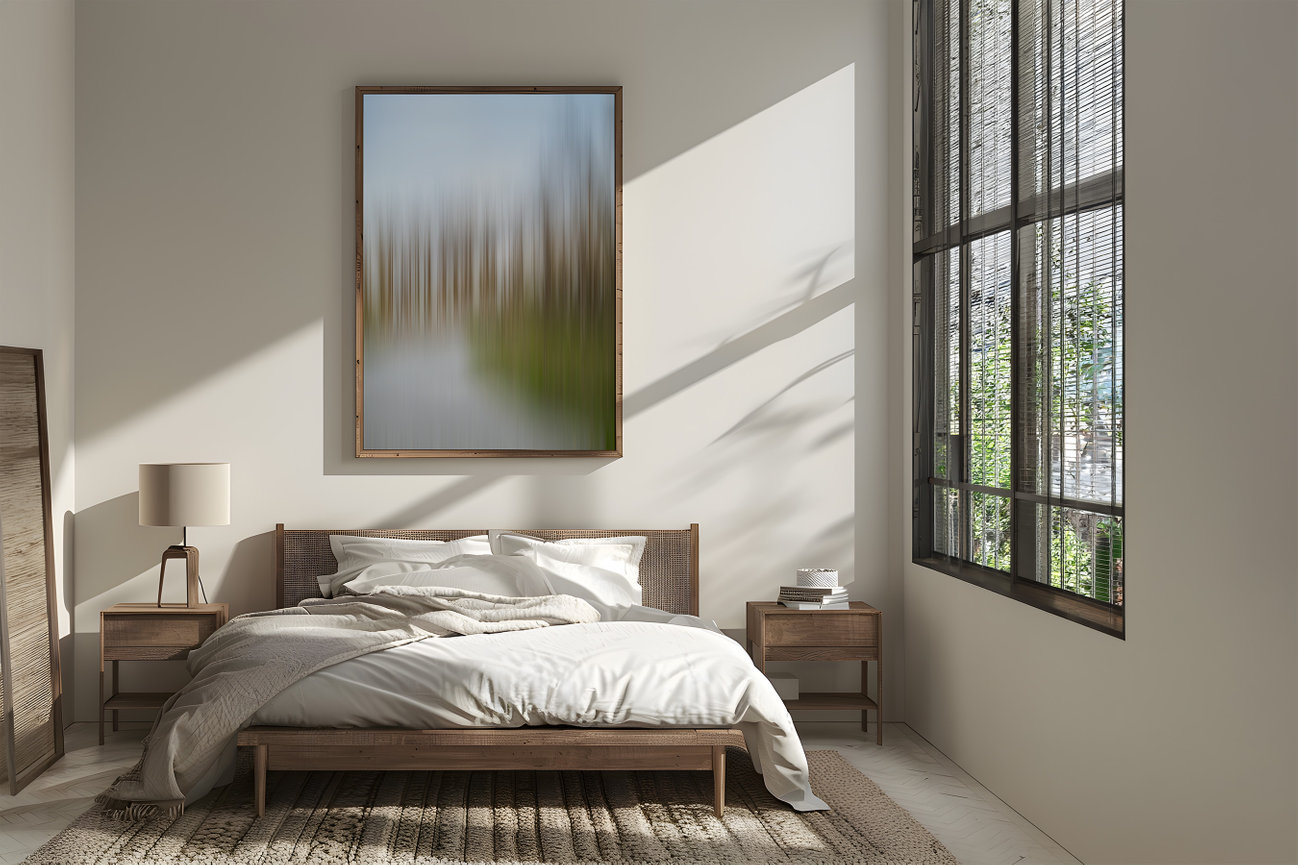 Sylvan abstract forest artwork by Andrea Bruns shown above a bed in a contemporary hospitality interior.