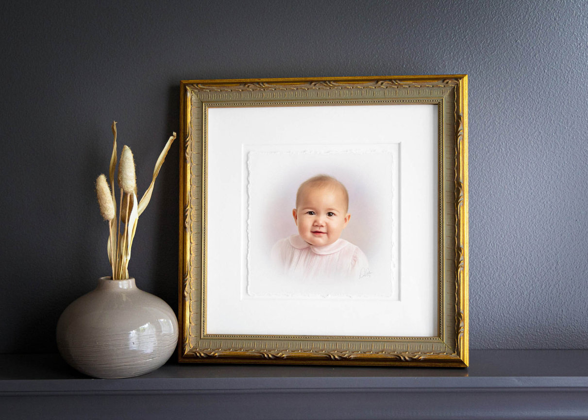 Heirloom portrait of a smiling girl in soft pastels, captured in a fine art style in Raleigh NC.