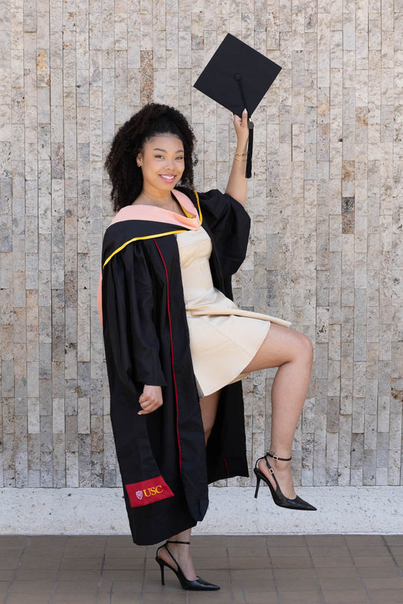 Portrait of a young woman in a jean jacket outdoors