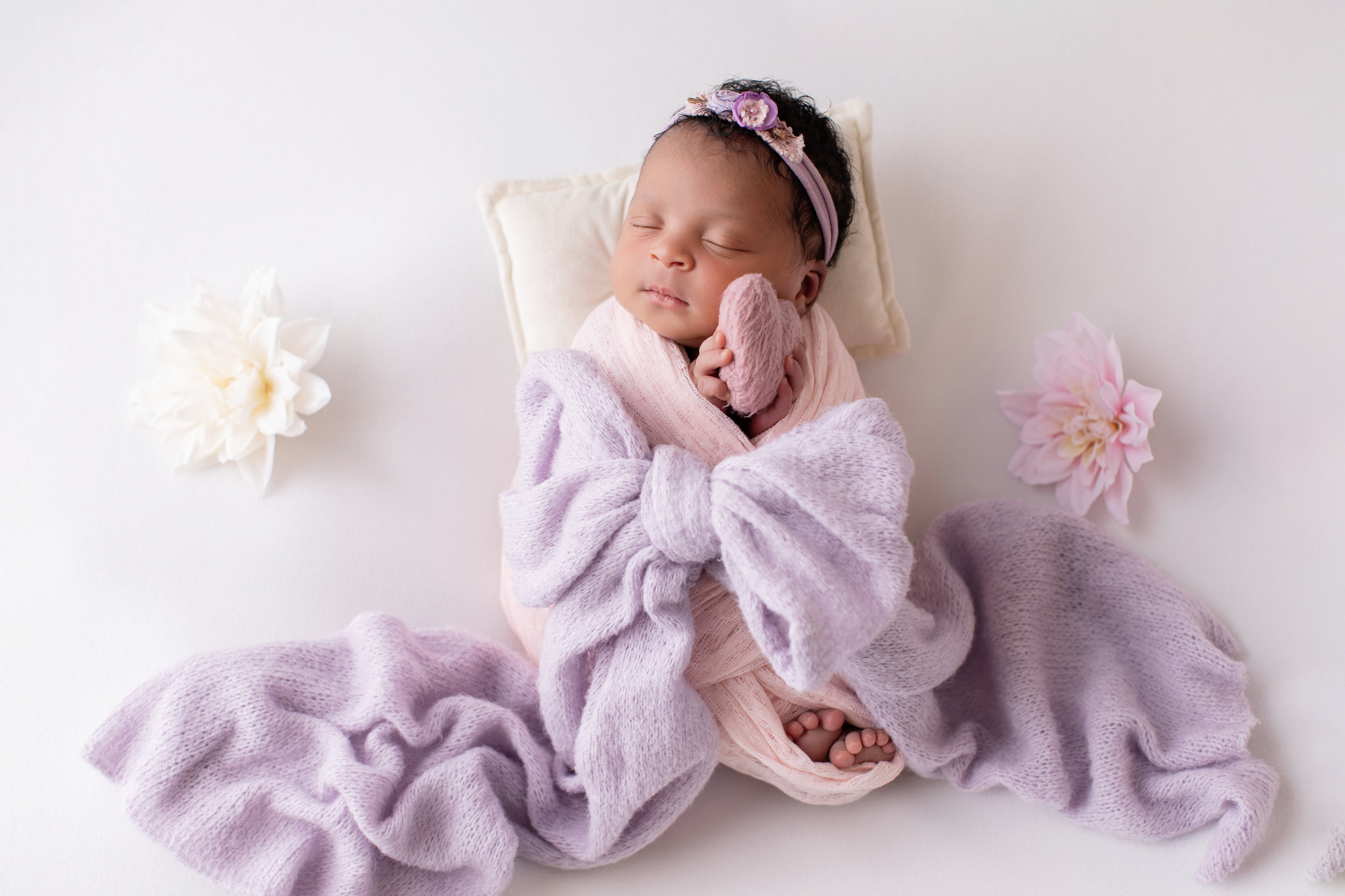 Calgary newborn photography lilac wrap daisies and family Newborn I session photo 4