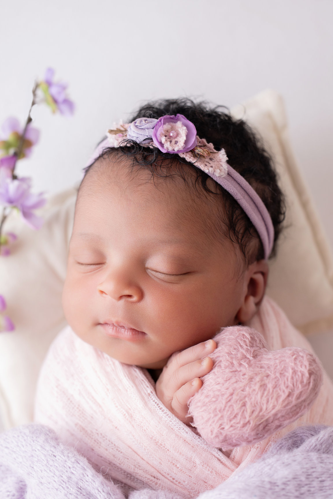 Calgary newborn photography lilac wrap daisies and family Newborn I session photo 1