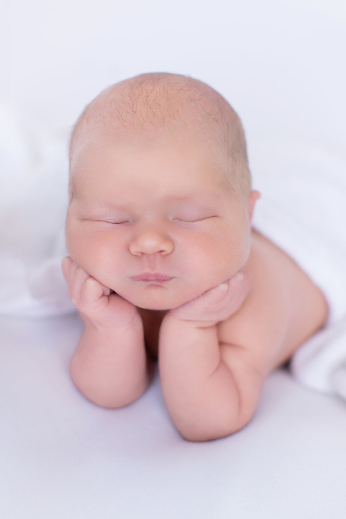 Calgary newborn photography white mauve and big brother love Newborn III session photo 6
