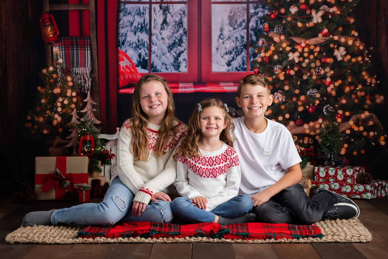 Kids Siblings Sisters In Santa Hats Near The Fireplace On Christmas Lights  Background, Lifestyle, Soft Focus, Christmas And New Year Concept Stock  Photo, Picture and Royalty Free Image. Image 66398595.